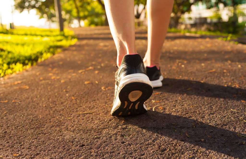 how walking more often can help reduce and prevent back pain health and wellness