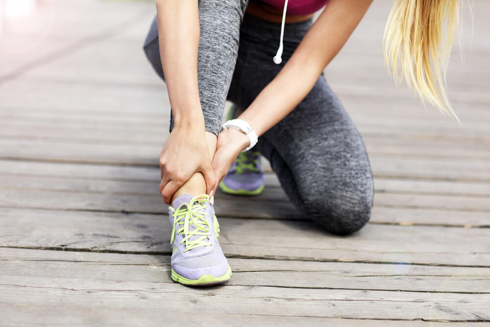 Two causes of sudden ankle pain without an injury shutterstock 658353976 top of ankle pain