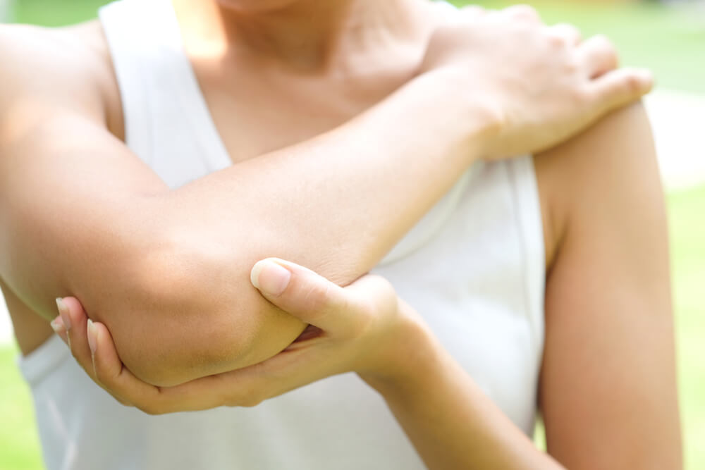Tennis elbow symptoms and treatment in Warrenton, MO shutterstock 1066761980 tennis elbow