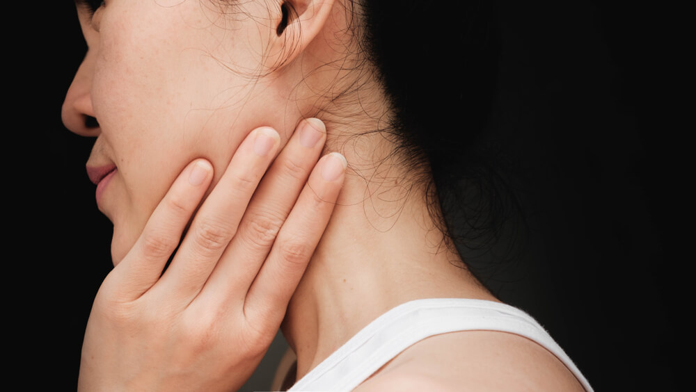 Two exercises to treat TMJ pain behind the ear in St. Louis, MO