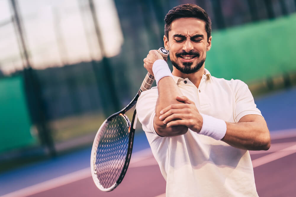 Why does my elbow hurt when I bend it? shutterstock 735675031 why does my elbow hurt when i bend it