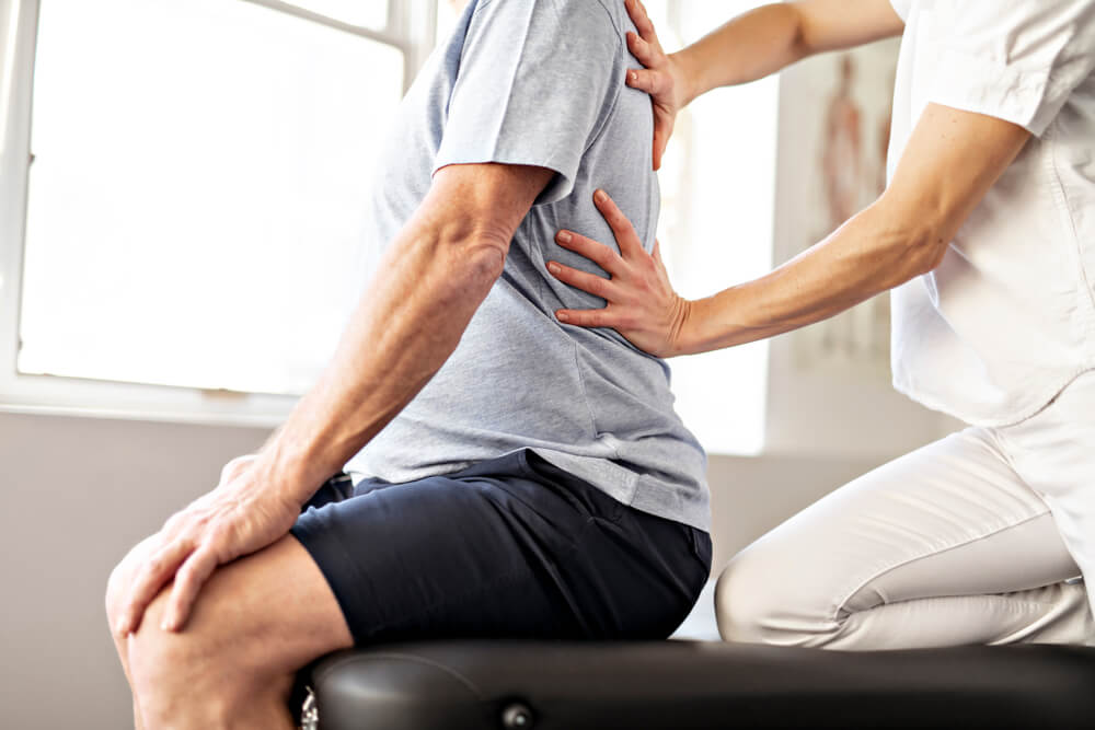 Can physical therapy help with pain in the center of the back? shutterstock 1293680515 pain in center of back