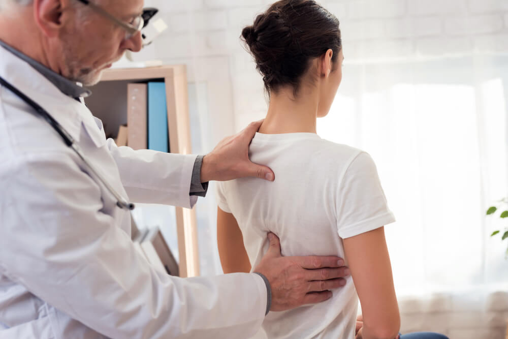 How long can it take for herniated discs to heal without surgery? shutterstock 1058162285 how long for herniated disc to heal without surgery