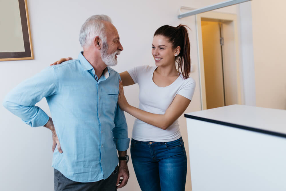 How can physical therapists help treat my lower back and knee pain? shutterstock 1037734645 lower back and knee pain