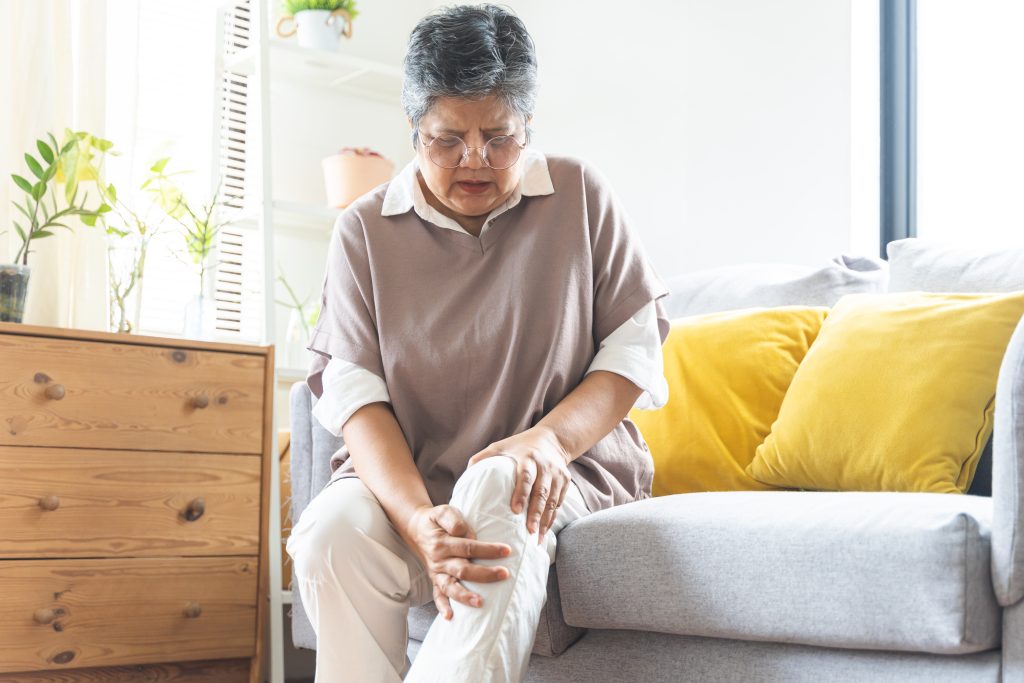 Can You Develop Knee Problems From Sitting Too Much? AdobeStock 1045479266 can you develop knee problems from sitting too much? knee pain