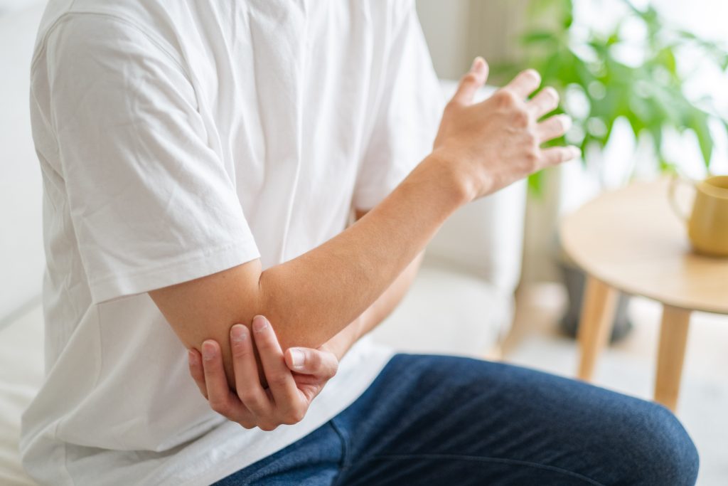 Why is My Elbow Stiff and Painful? AdobeStock 646401237 why is my elbow stiff and painful? elbow pain